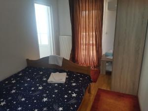 Postel nebo postele na pokoji v ubytování Stars Livezeni