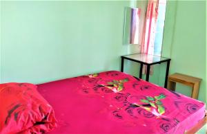 מיטה או מיטות בחדר ב-Kendang Kempul Hostel