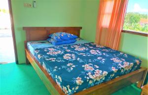 מיטה או מיטות בחדר ב-Kendang Kempul Hostel