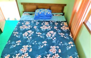 מיטה או מיטות בחדר ב-Kendang Kempul Hostel