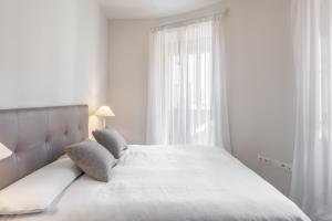 Posteľ alebo postele v izbe v ubytovaní Pinar Vip Class Malaga C/Alcazabilla