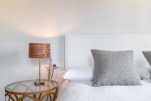 Posteľ alebo postele v izbe v ubytovaní Pinar Vip Class Malaga C/Alcazabilla