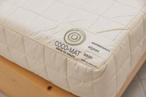 a close up of a white mattress on a table at Amalia in Matala