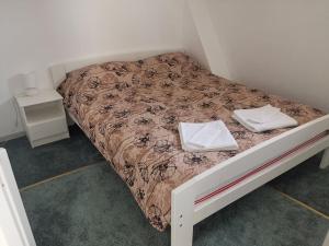 Postel nebo postele na pokoji v ubytování Stars Livezeni