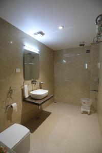 Koupelna v ubytování Hotel Pradeep Star Inn