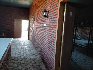 מיטה או מיטות בחדר ב-Kendang Kempul Hostel