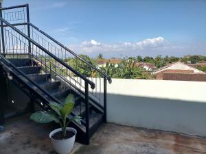 מרפסת או טרסה ב-Kendang Kempul Hostel