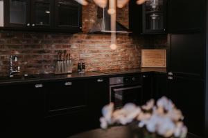 A kitchen or kitchenette at Apartmány Evia clinic