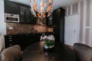 A kitchen or kitchenette at Apartmány Evia clinic