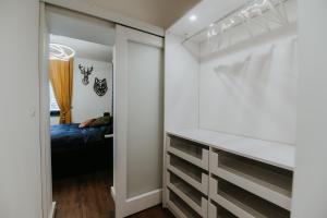 A bed or beds in a room at Apartmány Evia clinic