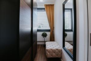 A bed or beds in a room at Apartmány Evia clinic