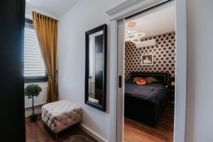 A bed or beds in a room at Apartmány Evia clinic
