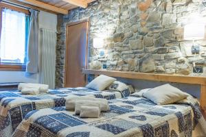 Ένα ή περισσότερα κρεβάτια σε δωμάτιο στο Hotel Piccolo Parco