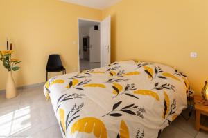 Postel nebo postele na pokoji v ubytování Le Gîte de Mélie