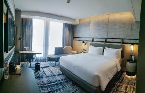 Mercure Surabaya Manyar客房内的一张或多张床位