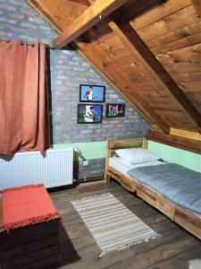 Postel nebo postele na pokoji v ubytování Kućerak X