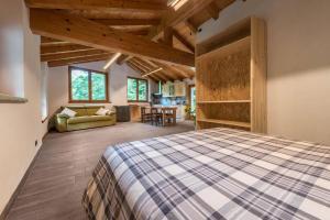 A bed or beds in a room at Casa al mulino