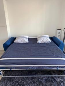 A bed or beds in a room at Stella mare à porticcio
