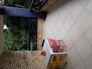 Un balcón o terraza de Casa de Pedra - 14 pessoas - Bombinhas IMB2
