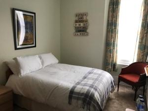Highlea House tesisinde bir odada yatak veya yataklar +6 fotoğraf