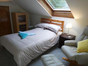 Un pat sau paturi într-o cameră la Kirkhouse