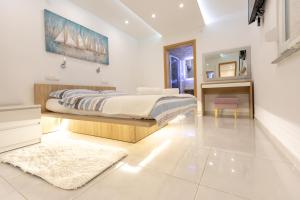 Postel nebo postele na pokoji v ubytování Luxury Apartment Aria