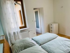Postel nebo postele na pokoji v ubytování das Höfchen Stadecken