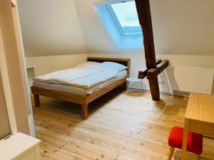 Ένα ή περισσότερα κρεβάτια σε δωμάτιο στο das Höfchen Stadecken