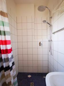 a bathroom with a shower and a sink at Ulm 2-room Apartment near university & city Centre in Ulm