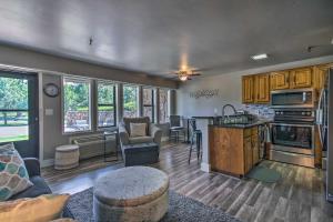 a large living room with a kitchen and a living room at Pool Access Condo with Patio in Afton in Afton