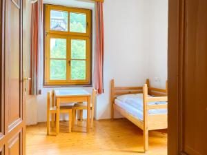Letto o letti in una camera di Gasthof Elisabeth