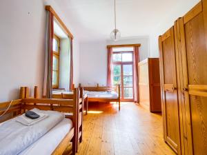 Letto o letti in una camera di Gasthof Elisabeth
