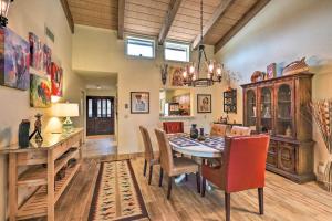 a dining room with a table and chairs at Sedona Home with Golf Course View and Pool Access! in Sedona