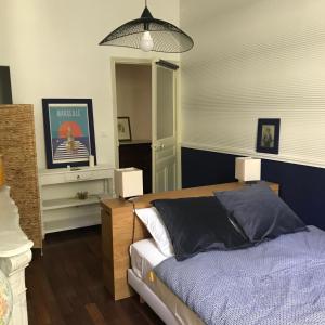 Le Transvaal-Maison d'Hôtes房間的床