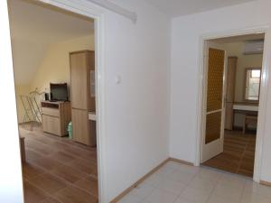a view of a living room from the hallway at Hold-on apartman in Gyula +2 photos