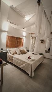 Lova arba lovos apgyvendinimo įstaigoje Borgo San Giovanni Luxury