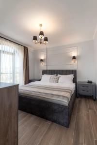 Postel nebo postele na pokoji v ubytování LAGUN CASTLE HOTEL&SPA