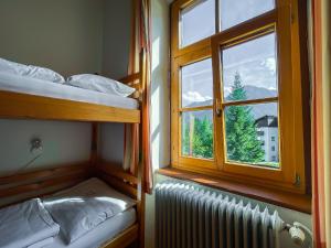 Letto o letti in una camera di Gasthof Elisabeth