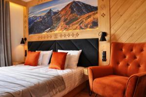 Postel nebo postele na pokoji v ubytování TATRY NA WYPASIE