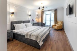 Postel nebo postele na pokoji v ubytování LAGUN CASTLE HOTEL&SPA