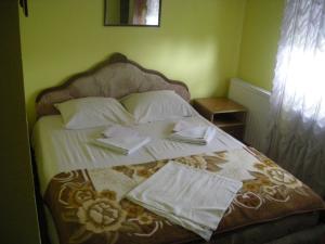Letto o letti in una camera di UTR Jagnjilo 1986