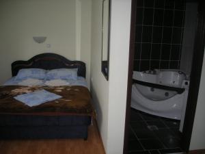 Letto o letti in una camera di UTR Jagnjilo 1986