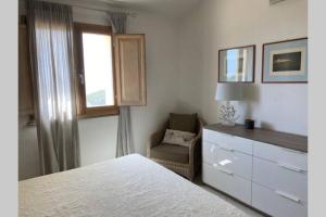 Ένα ή περισσότερα κρεβάτια σε δωμάτιο στο The refuge on the sea...