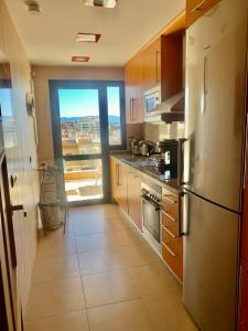 A kitchen or kitchenette at SEA & CASTILLO VIEW