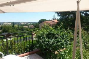 En balkong eller terrass på Maison avec climatisation 230 M2 10 km centre Toulouse