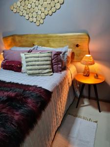 Cama ou camas em um quarto em Refúgio dos Coiotes