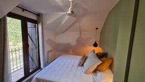 Postel nebo postele na pokoji v ubytování Tierra Boutique, Tierra Suites y Tierra Valles Apartamentos
