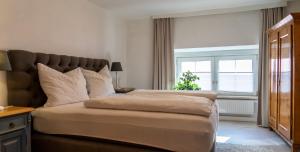 Ένα ή περισσότερα κρεβάτια σε δωμάτιο στο Modern Apartment in the City Center of Bad Ischl +27 φωτογραφίες