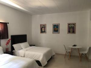 Postel nebo postele na pokoji v ubytování Hotel boutique turquesa + 37 fotografií
