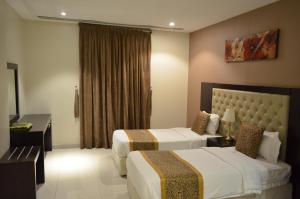 Ένα ή περισσότερα κρεβάτια σε δωμάτιο στο Open Hotel Alolaya